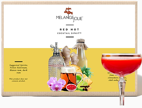 Mélange Jolie Red Hot Cocktail SipKit™ featuring vibrant ingredients and elegant coupe glass, perfect for cocktail enthusiasts.